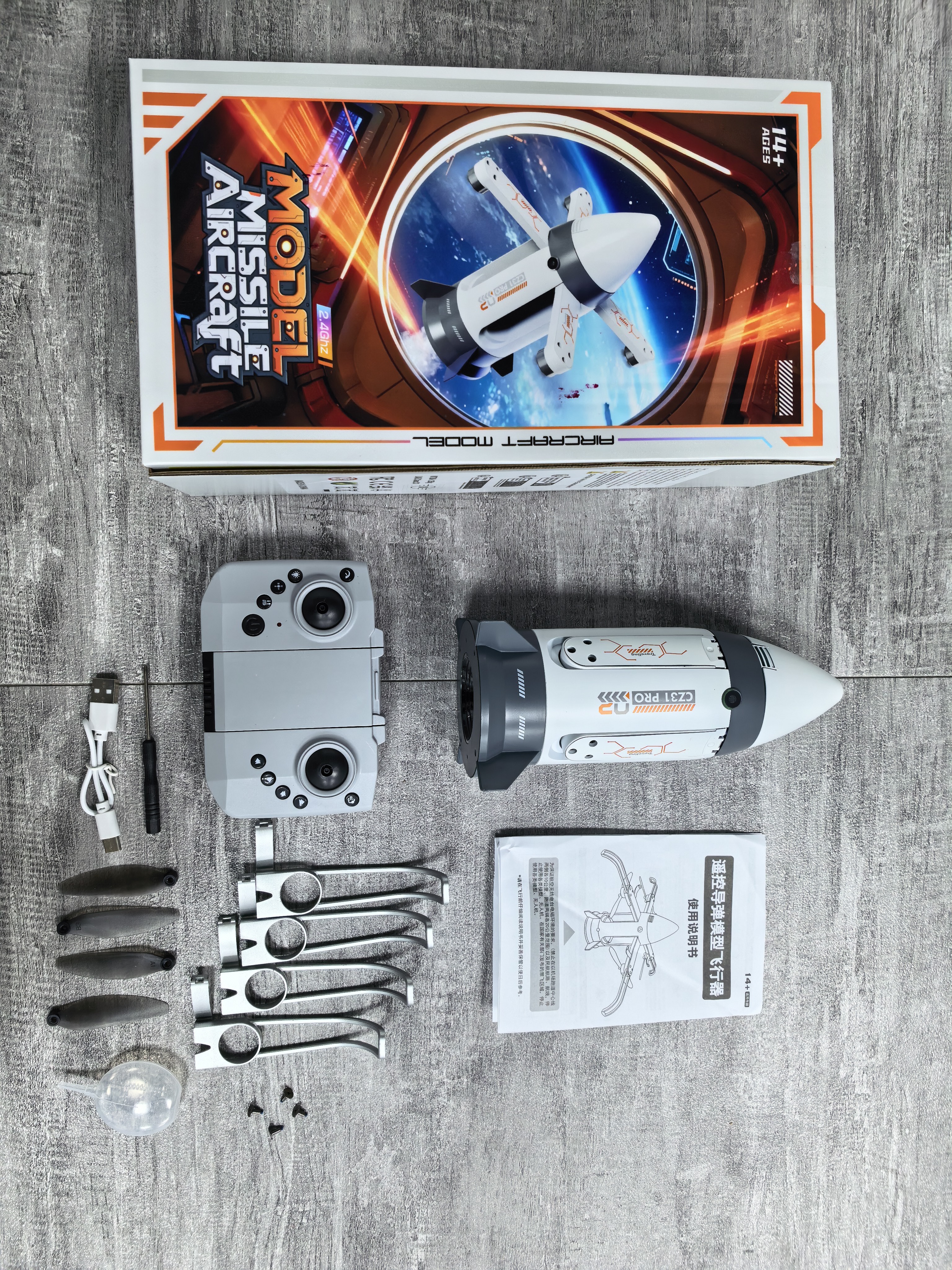 Brushless motor folding RC spray rocket with camera